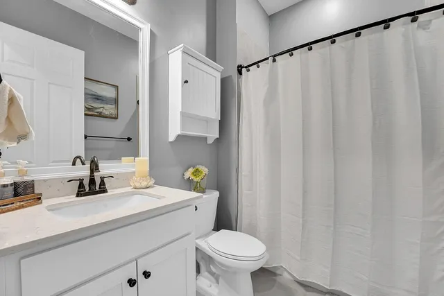 a street sign that is sitting in the grass