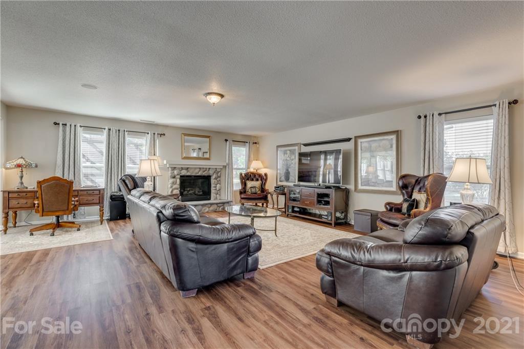 199 Old Carriage Road Clover, SC 29710 - Photo 6 of 48 a living room with furniture and a fireplace