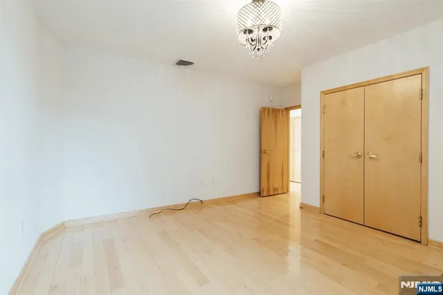 a view of empty room with a window