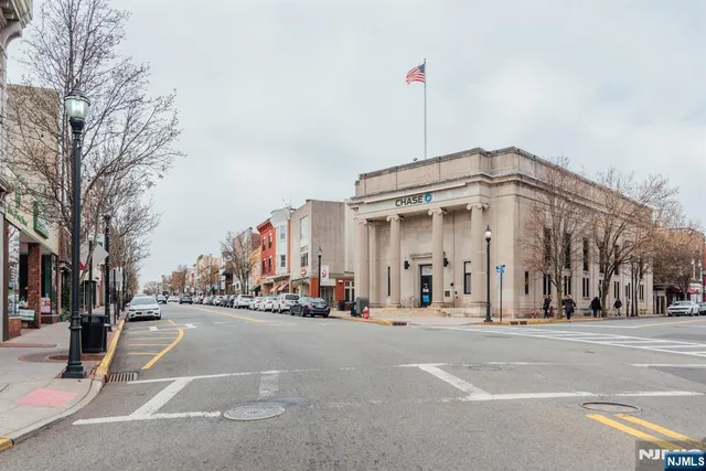 a view of a building with a street