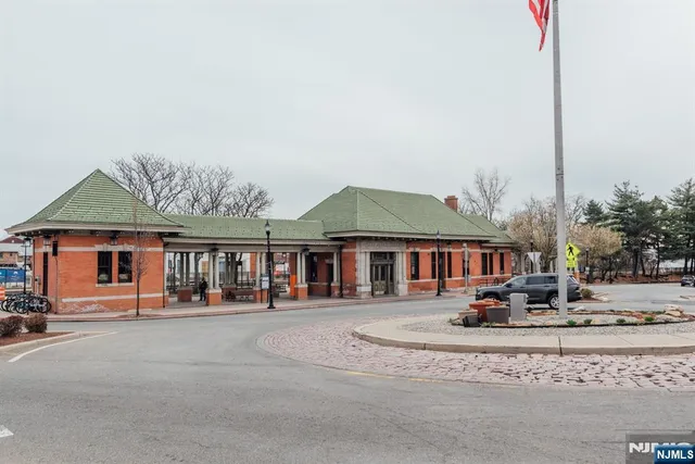 a front view of a house with street view