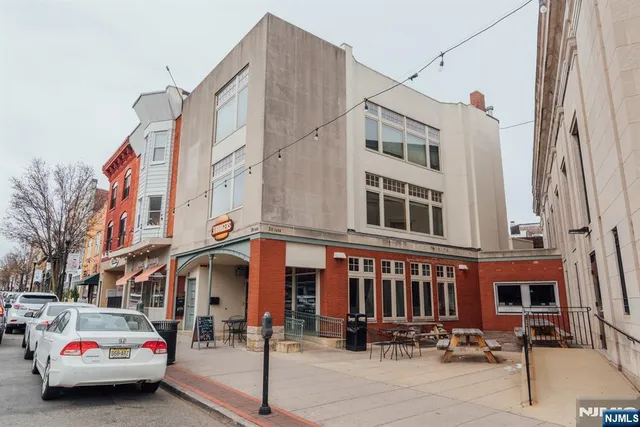 a car parked in front of a building