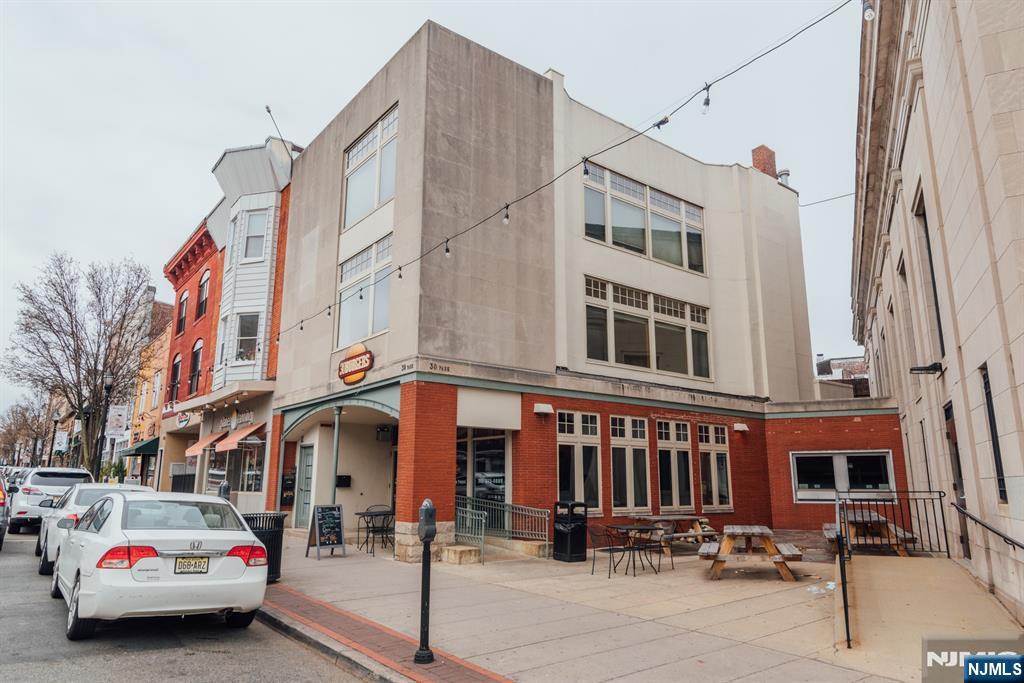 30 Park Avenue, Unit 2 Rutherford, NJ 07070 - Photo 5 of 31 a car parked in front of a building