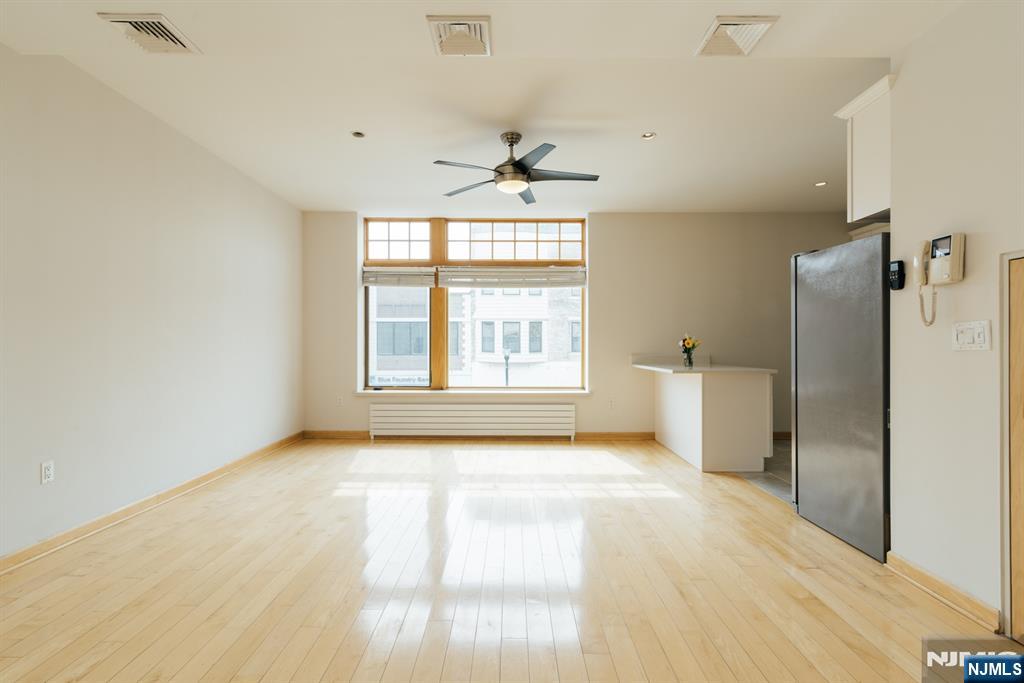 30 Park Avenue, Unit 2 Rutherford, NJ 07070 - Photo 8 of 31 a view of an empty room with a window