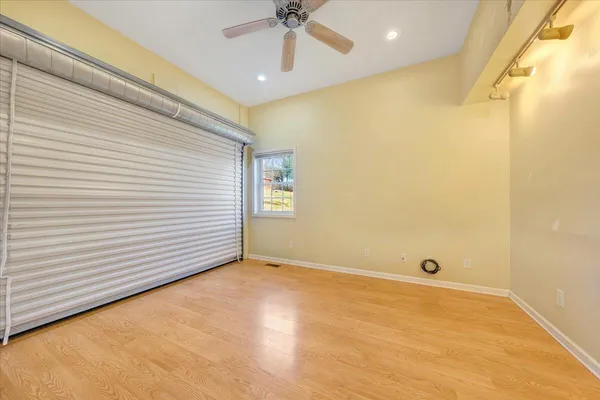 a view of a room with racks on the wall