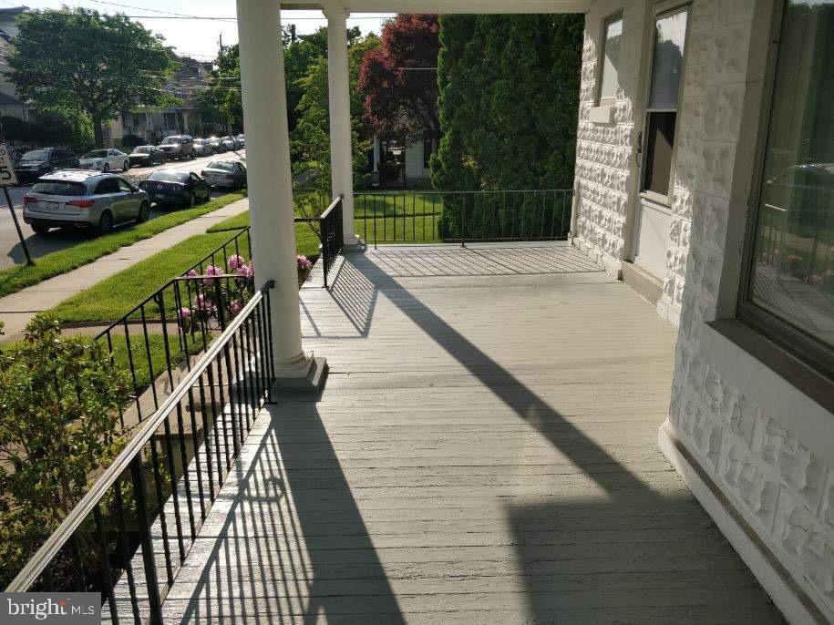 39 Philadelphia Avenue Reading, PA 19607 - Photo 3 of 32 Front porch, looking northwest toward Lanc. Ave.