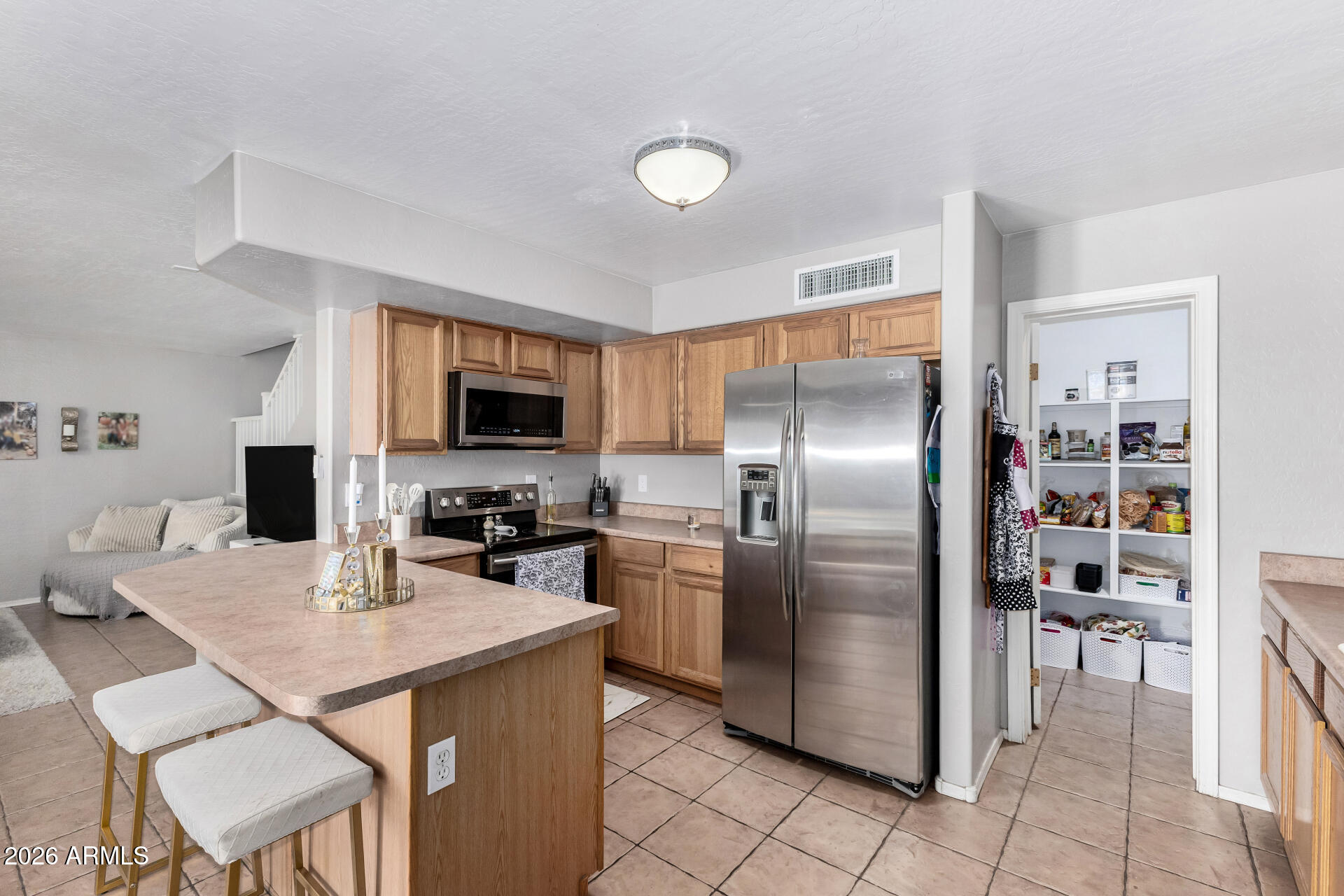 14791 West Bloomfield Road Surprise, AZ 85379 - Photo 13 of 37 Kitchen with Walk In Pantry