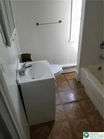 a bathroom with a bathtub