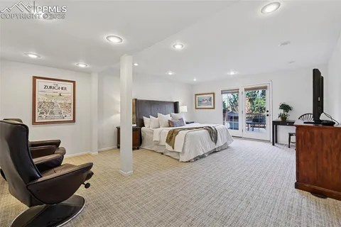 a bed room with a bed and a couch