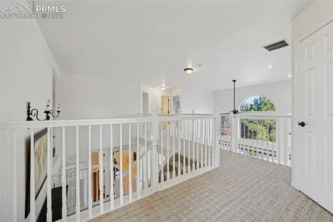 a view of hallway with stairs