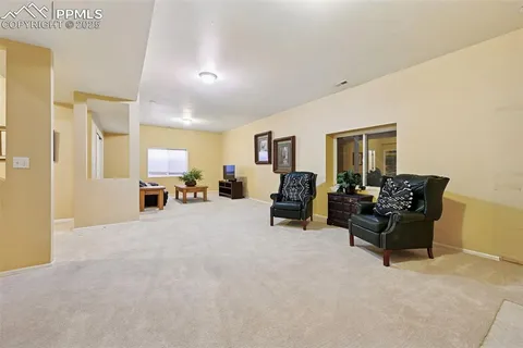 a view of a livingroom with furniture and a couch