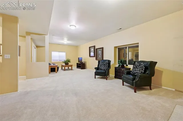 a view of a livingroom with furniture and a couch