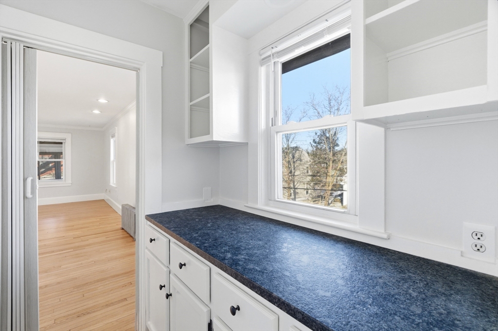 29-31 Edward T Sullivan Road, Unit 2 Cambridge, MA 02138 - Photo 13 of 34 a view of an empty room and window