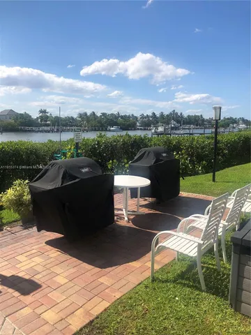 a view of a terrace with sitting area
