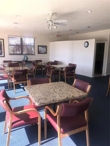a room with furniture and wooden floor