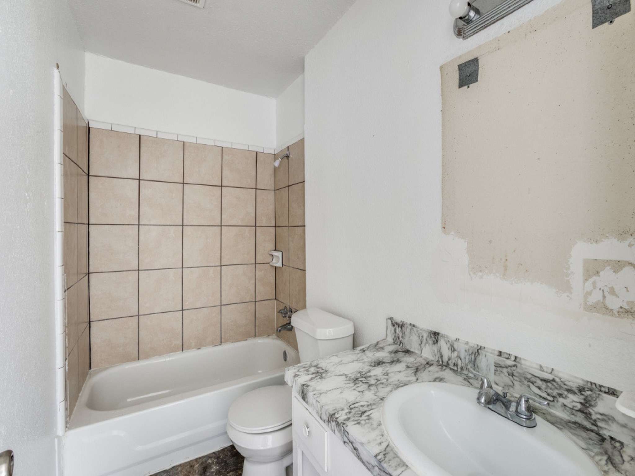 1711 Wichita Street, Unit 2 Houston, TX 77004 - Photo 11 of 12 a bathroom with a sink toilet and shower