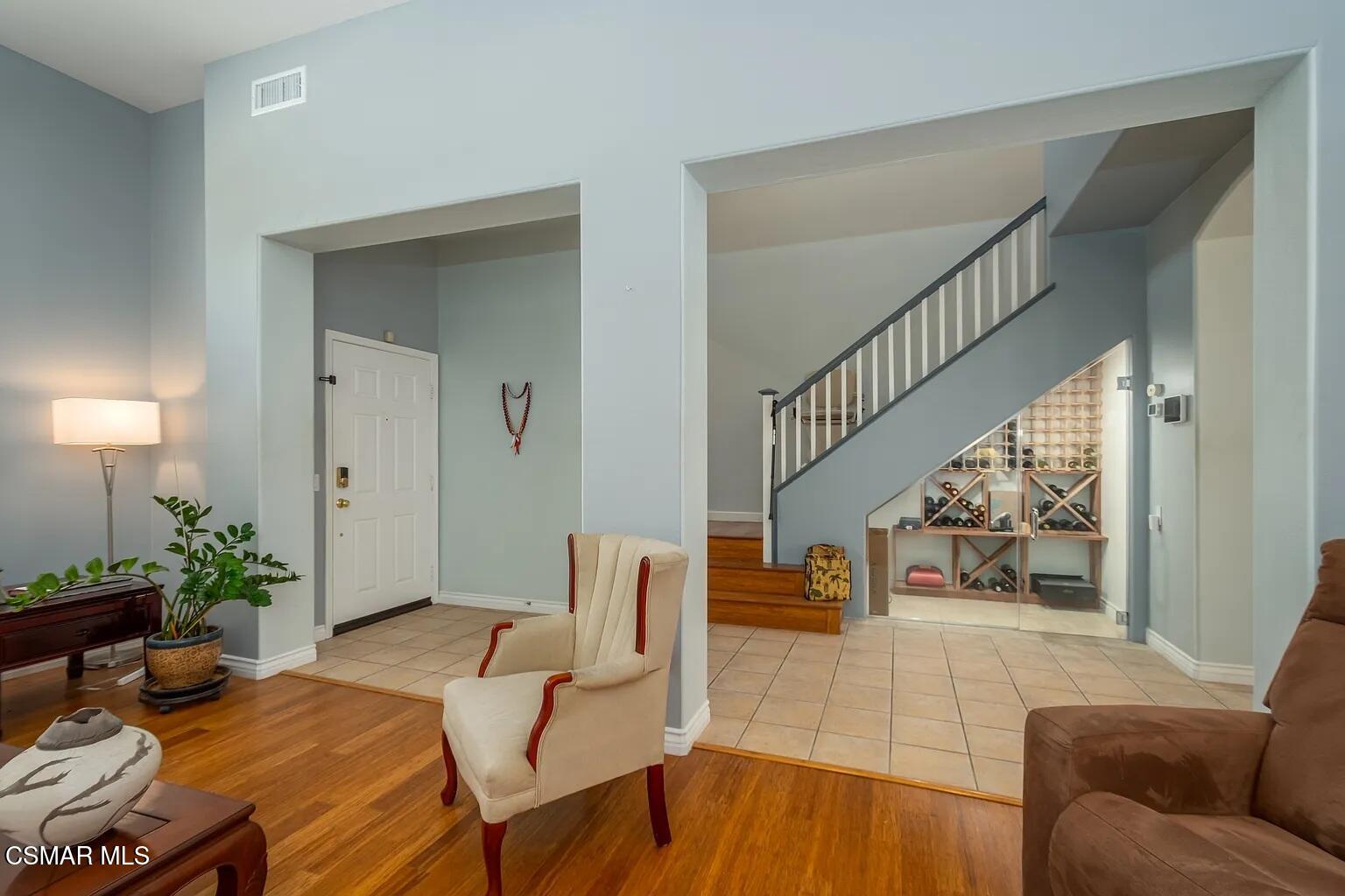 728 Navito Way Oxnard, CA 93030 - Photo 5 of 43 a living room with furniture and wooden floor