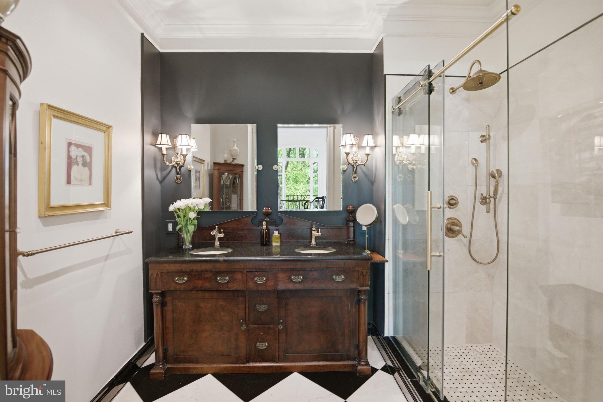 2815 Q Street Northwest Washington, DC 20007 - Photo 20 of 32 a bathroom with a double vanity sink mirror and shower