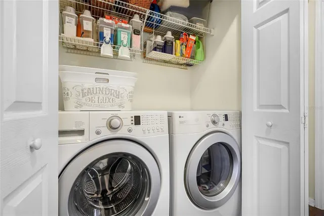 a utility room with dryer and washer
