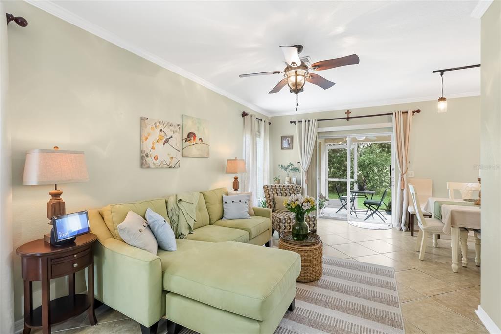 14847 Skip Jack Loop Lakewood Ranch, FL 34202 - Photo 2 of 26 a living room with furniture