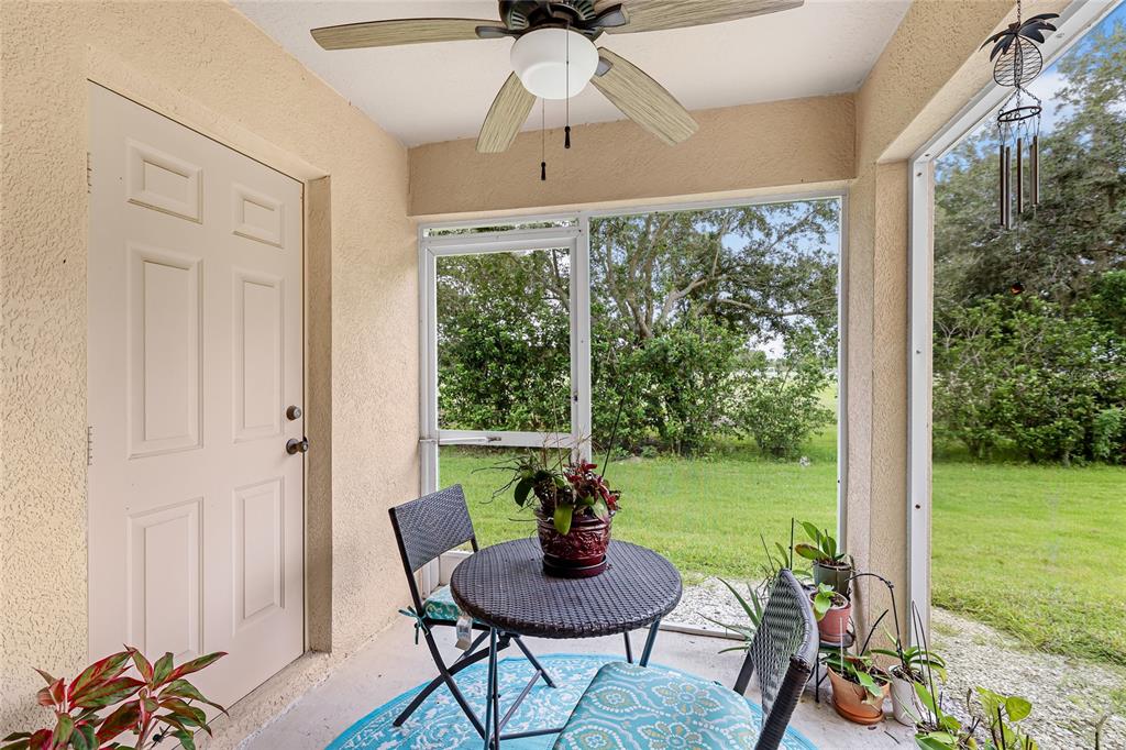 14847 Skip Jack Loop Lakewood Ranch, FL 34202 - Photo 25 of 26 a view of a dining room with furniture window and outside view