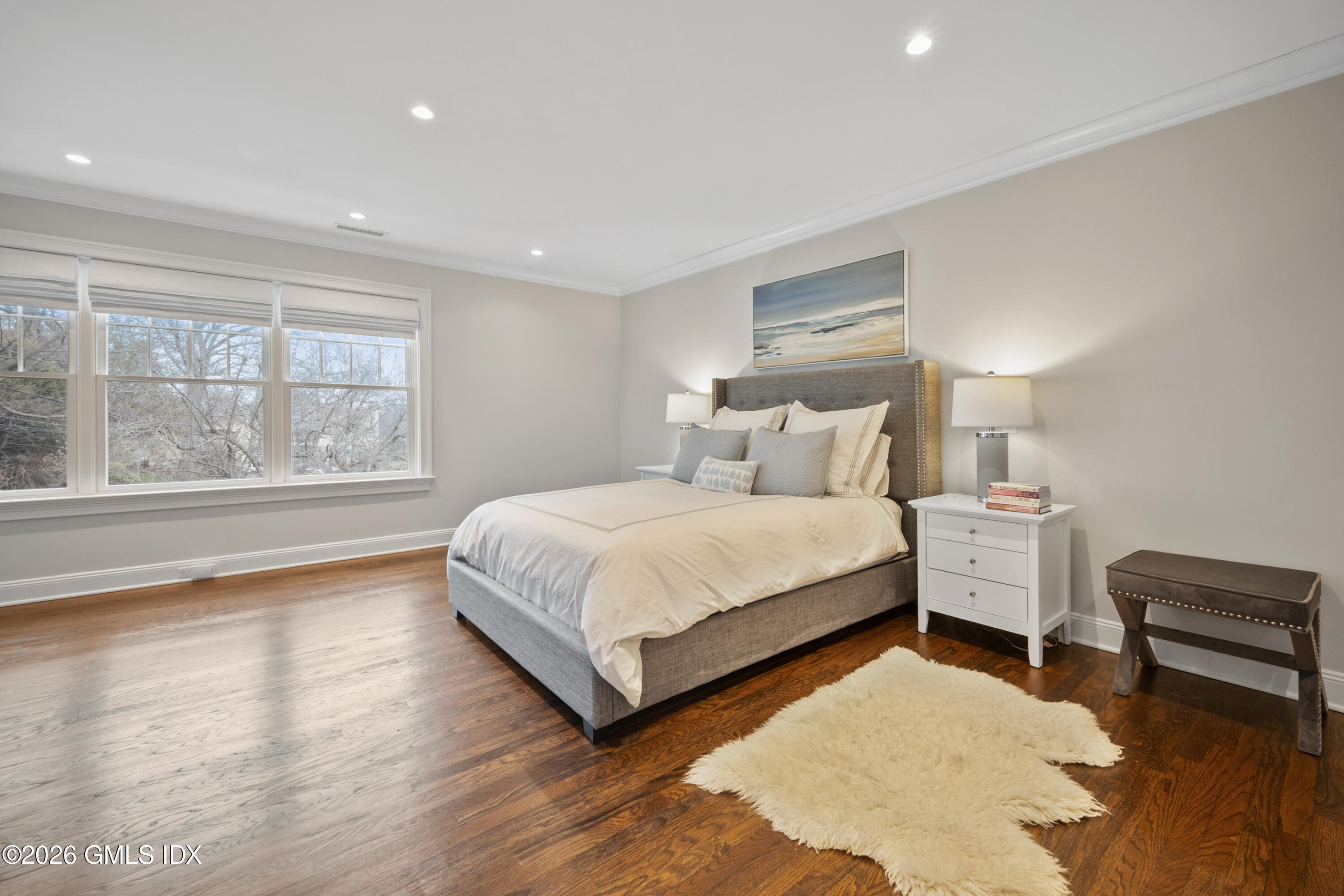 15 Pell Place Riverside, CT 06878 - Photo 15 of 35 a bedroom with a bed and large window