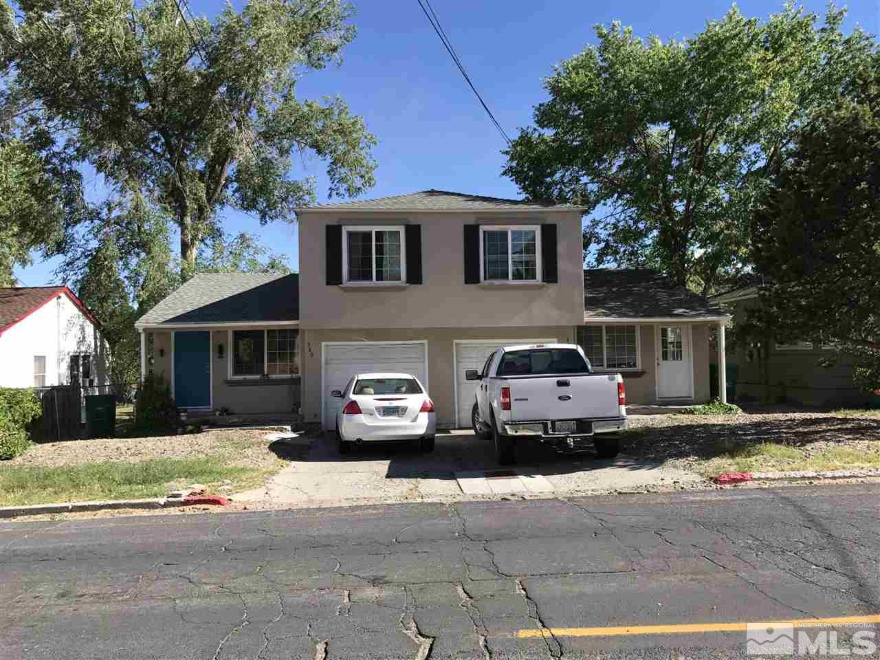 380 West 11th Street Reno, NV 89503 - Photo 1 of 1 a car parked in front of a house