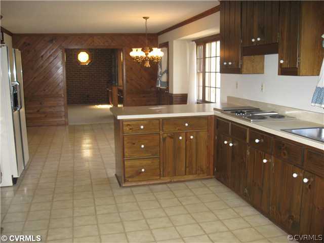 5224 Copperpenny Road Chesterfield, VA 23832 - Photo 8 of 12 a kitchen with a sink and cabinets