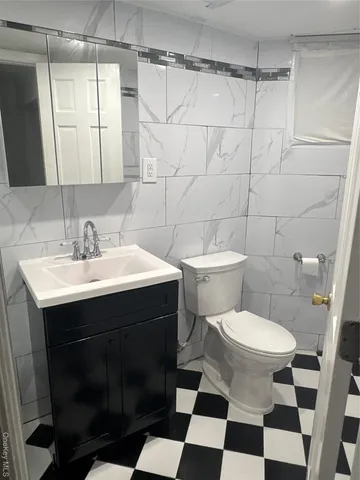 a bathroom with a shower and a tub
