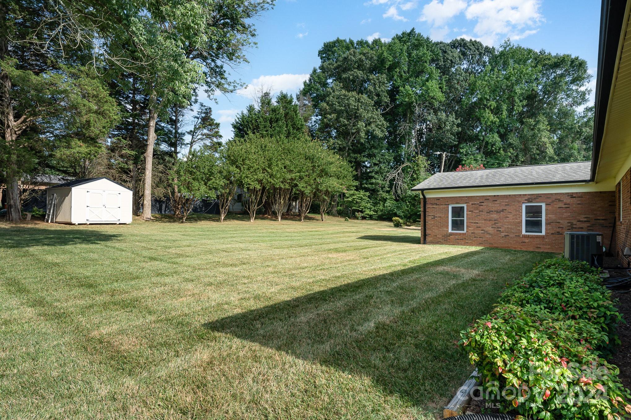 6308 Sunset Circle Charlotte, NC 28216 - Photo 26 of 30 a view of a house with backyard