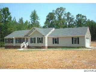 3550 Courtland Road Disputanta, VA 23842 - Photo 1 of 1 a front view of a house with a yard