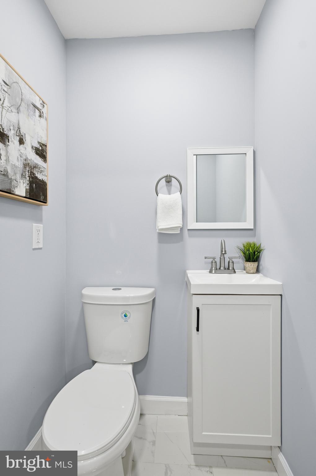 6 New County Road Aberdeen, MD 21001 - Photo 14 of 44 a white toilet sitting next to a bathroom sink