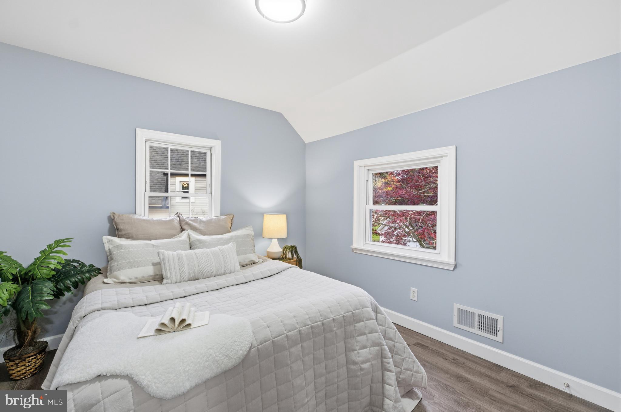 6 New County Road Aberdeen, MD 21001 - Photo 22 of 44 a bedroom with a bed and a painting on the wall