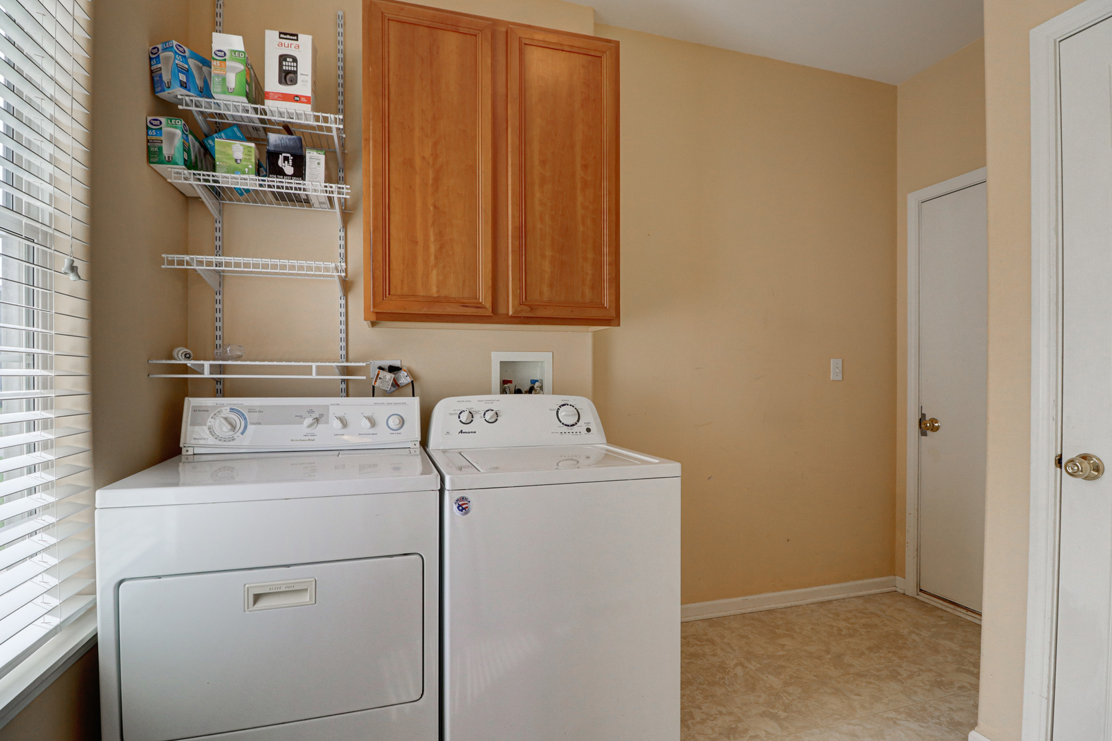 32670 Innetowne Road Lakemoor, IL 60051 - Photo 17 of 25 a utility room with dryer and washer