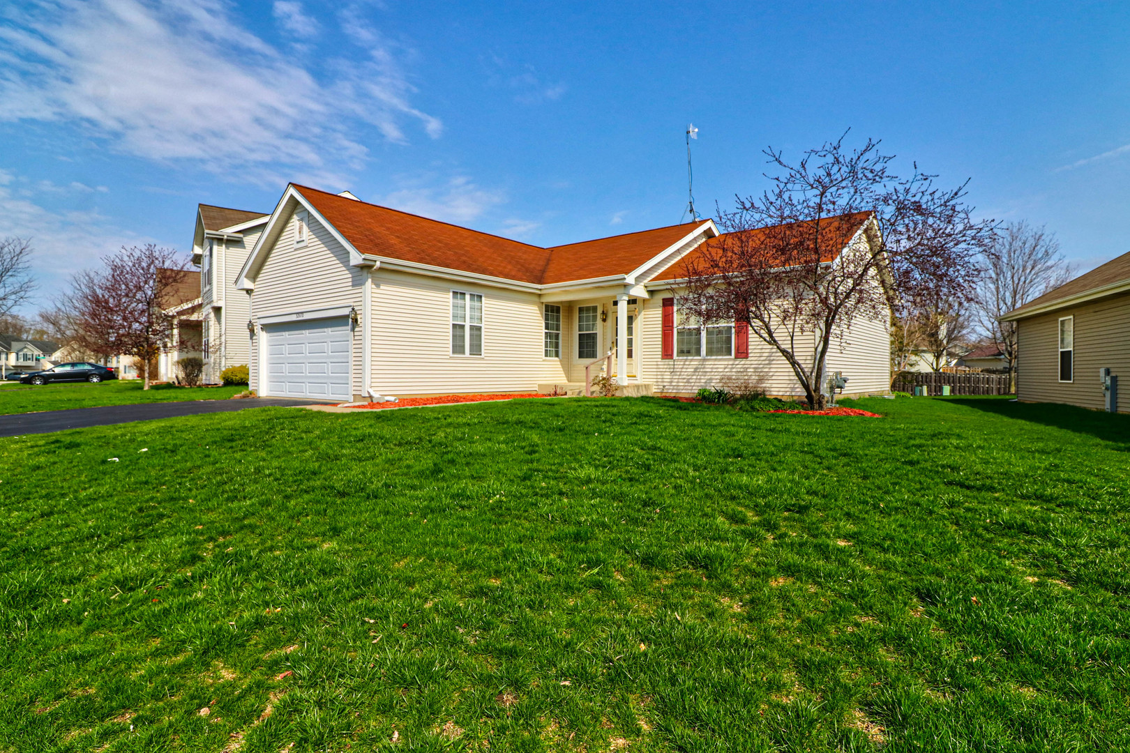32670 Innetowne Road Lakemoor, IL 60051 - Photo 2 of 25 a front view of house with yard and green space