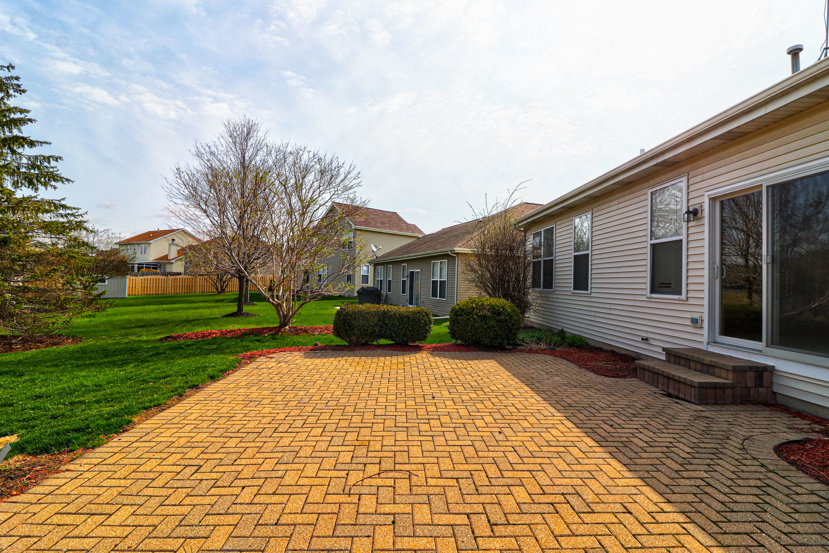 32670 Innetowne Road Lakemoor, IL 60051 - Photo 24 of 25 a view of a house with a yard