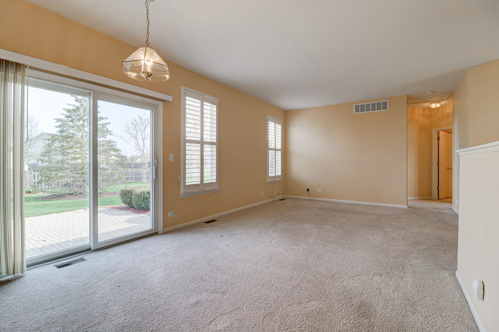 32670 Innetowne Road Lakemoor, IL 60051 - Photo 10 of 25 a view of an empty room with windows