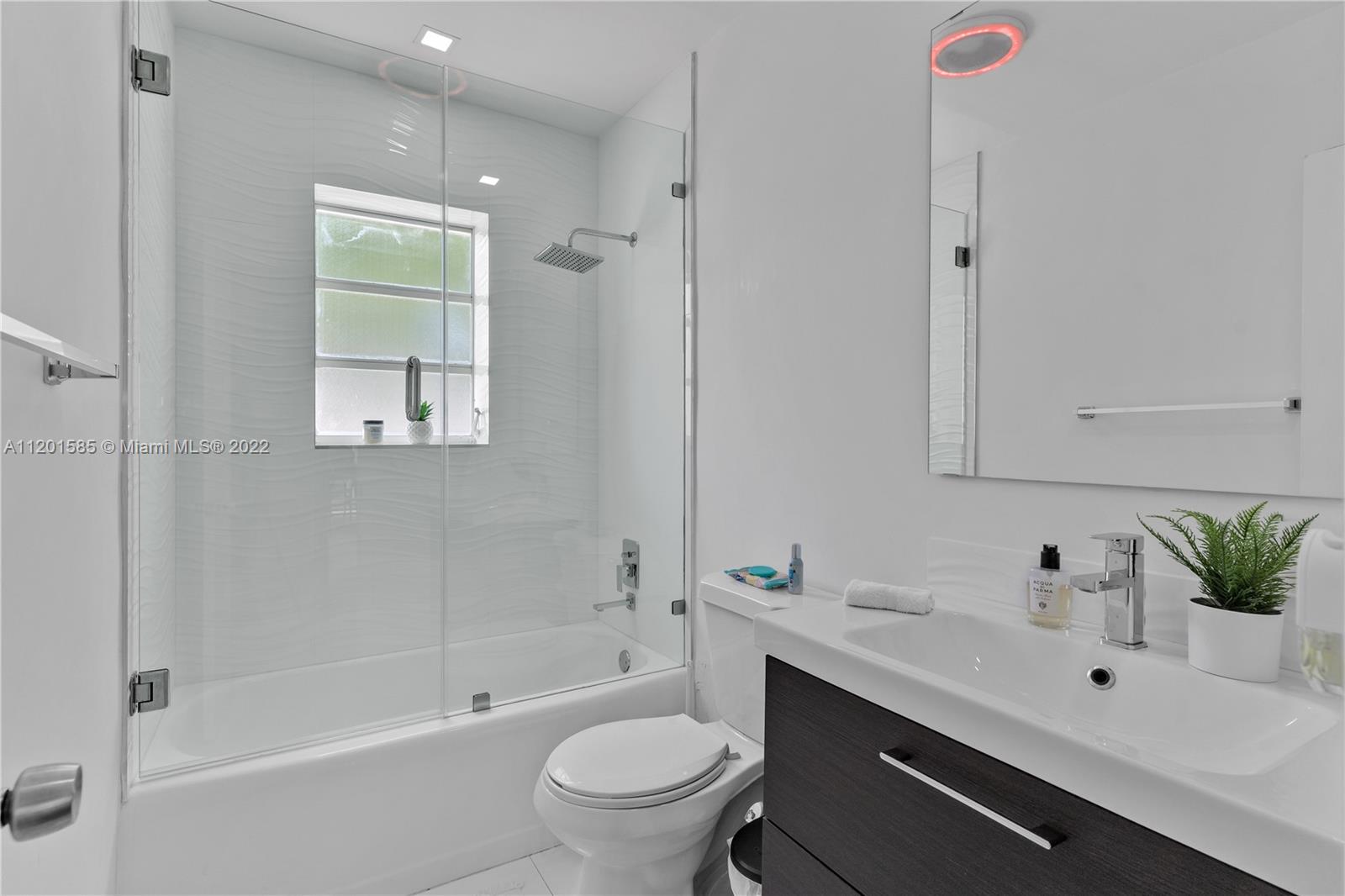 19620 Franjo Road Cutler Bay, FL 33157 - Photo 13 of 28 a bathroom with a sink a toilet and shower