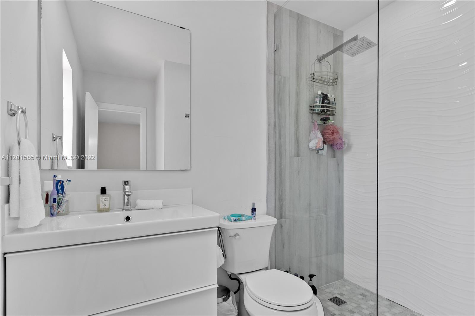 19620 Franjo Road Cutler Bay, FL 33157 - Photo 18 of 28 a bathroom with a sink toilet and shower
