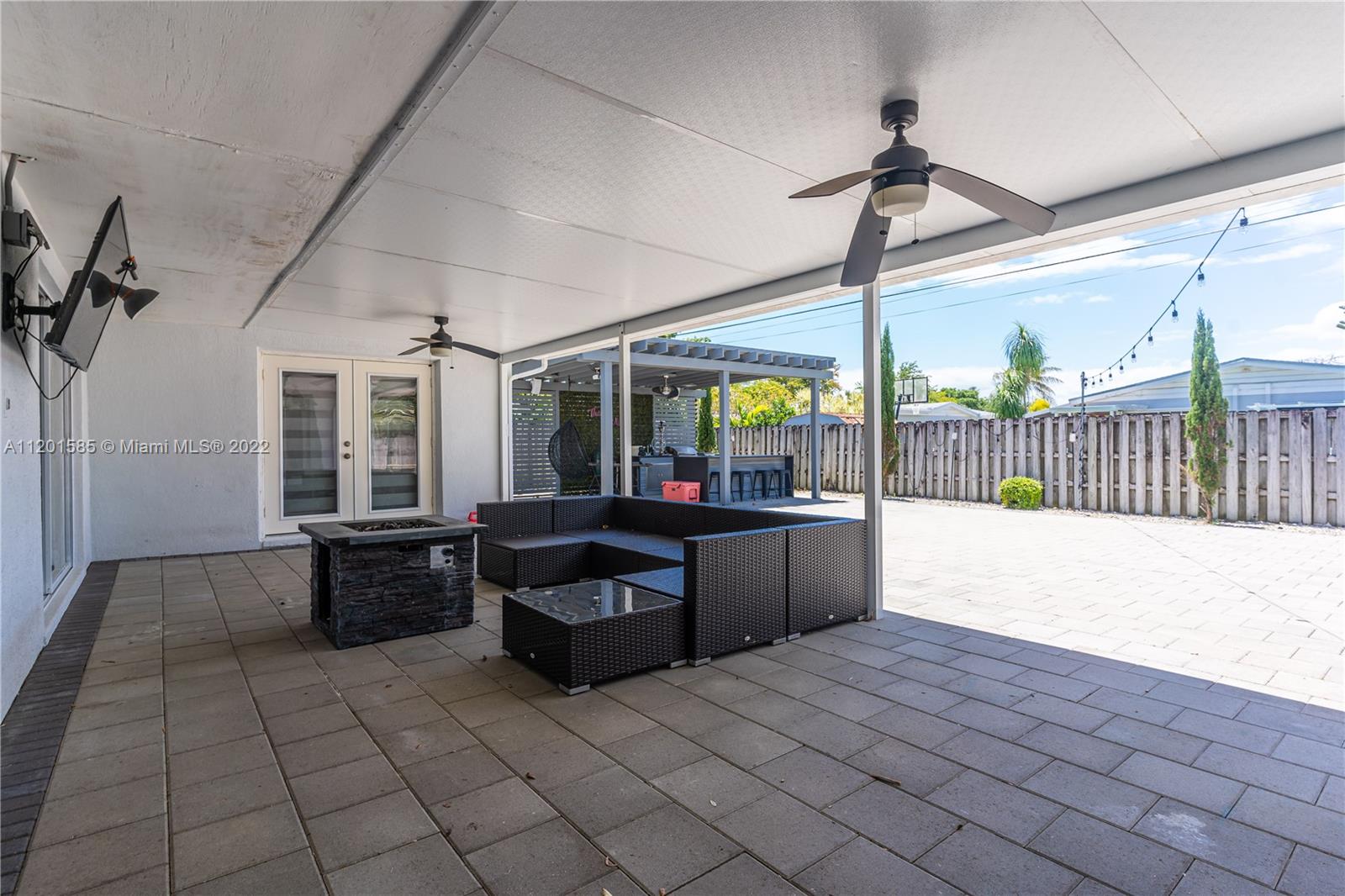 19620 Franjo Road Cutler Bay, FL 33157 - Photo 26 of 28 a view of a chairs and tables in patio