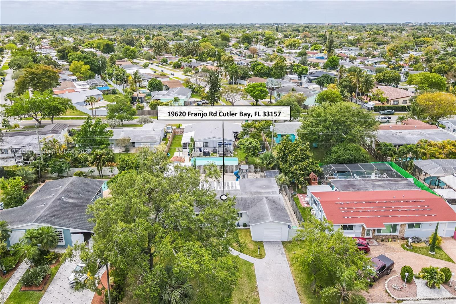 19620 Franjo Road Cutler Bay, FL 33157 - Photo 27 of 28 an aerial view of residential houses with outdoor space and trees all around