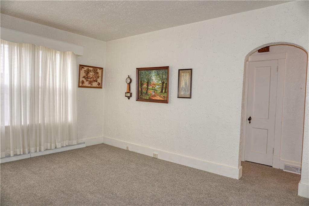 561 5th Street Butler, PA 16001 - Photo 7 of 25 The spacious living area features brand new carpet!
