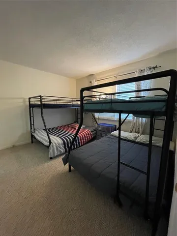 a bedroom with bunk bed