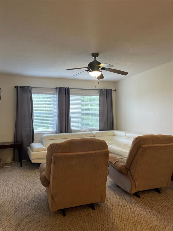 2851 East Golf Boulevard, Unit 206 Pompano Beach, FL 33064 - Photo 17 of 35 a bedroom with a bed and a couch