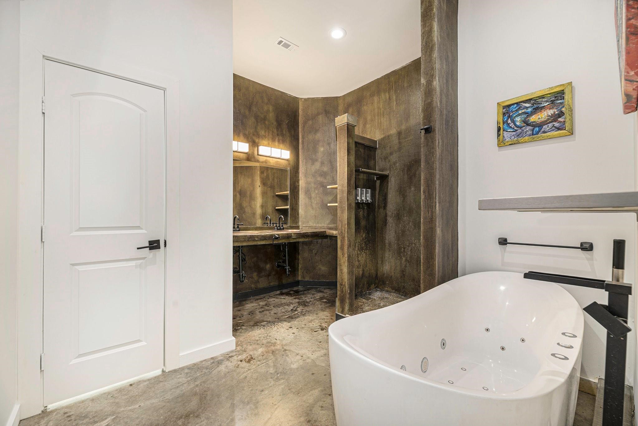 475 Pinnacle Trinity, TX 75862 - Photo 17 of 23 a bathroom with a bathtub and a shower