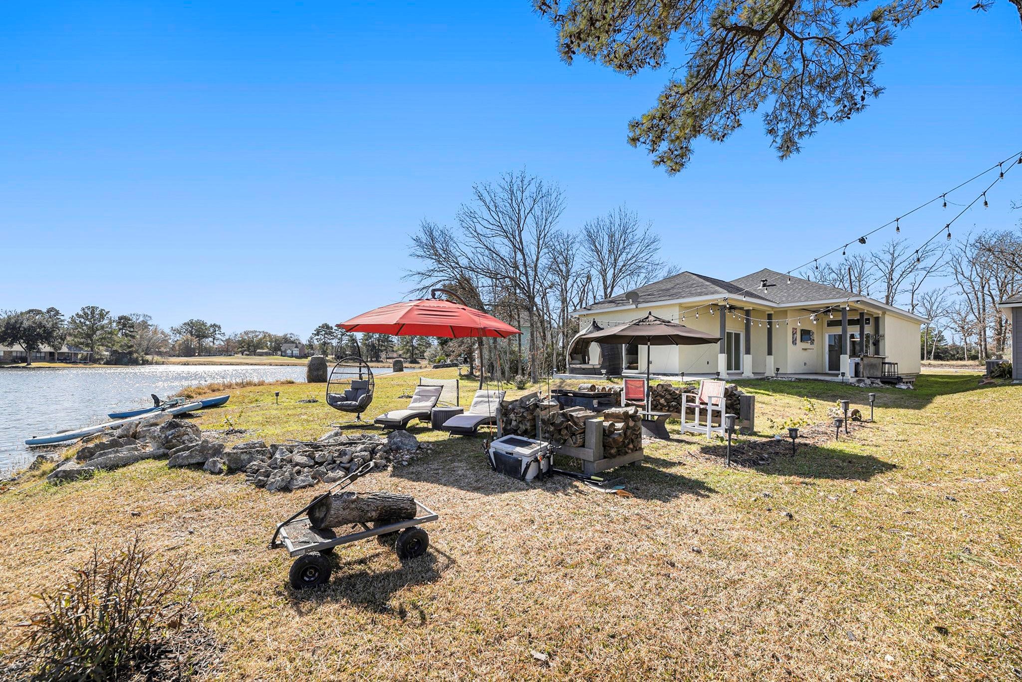 475 Pinnacle Trinity, TX 75862 - Photo 23 of 23 a swimming pool with outdoor seating and barbeque oven