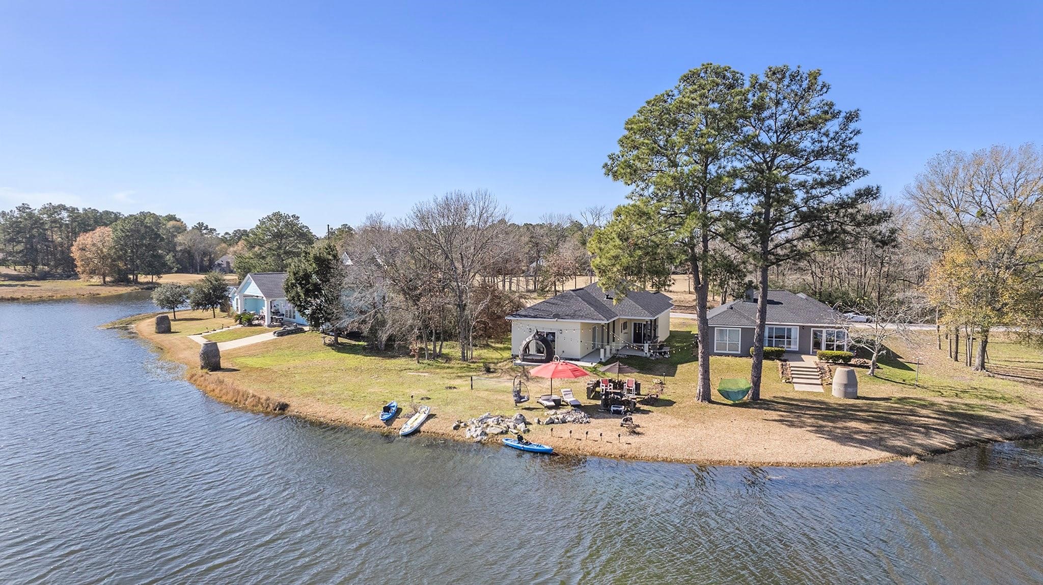 475 Pinnacle Trinity, TX 75862 - Photo 4 of 23 a view of a swimming pool with an outdoor seating