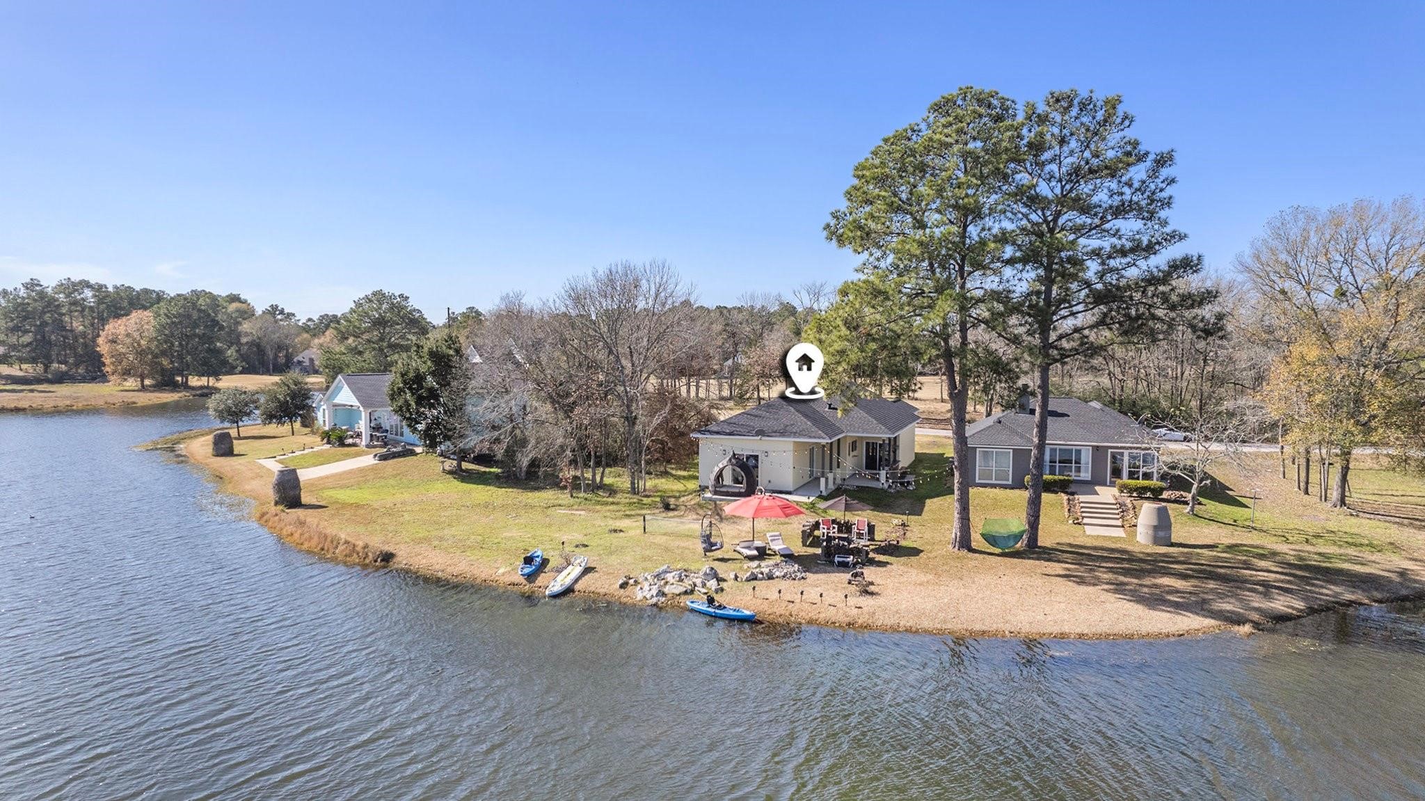 475 Pinnacle Trinity, TX 75862 - Photo 7 of 23 a view of a swimming pool with an outdoor seating