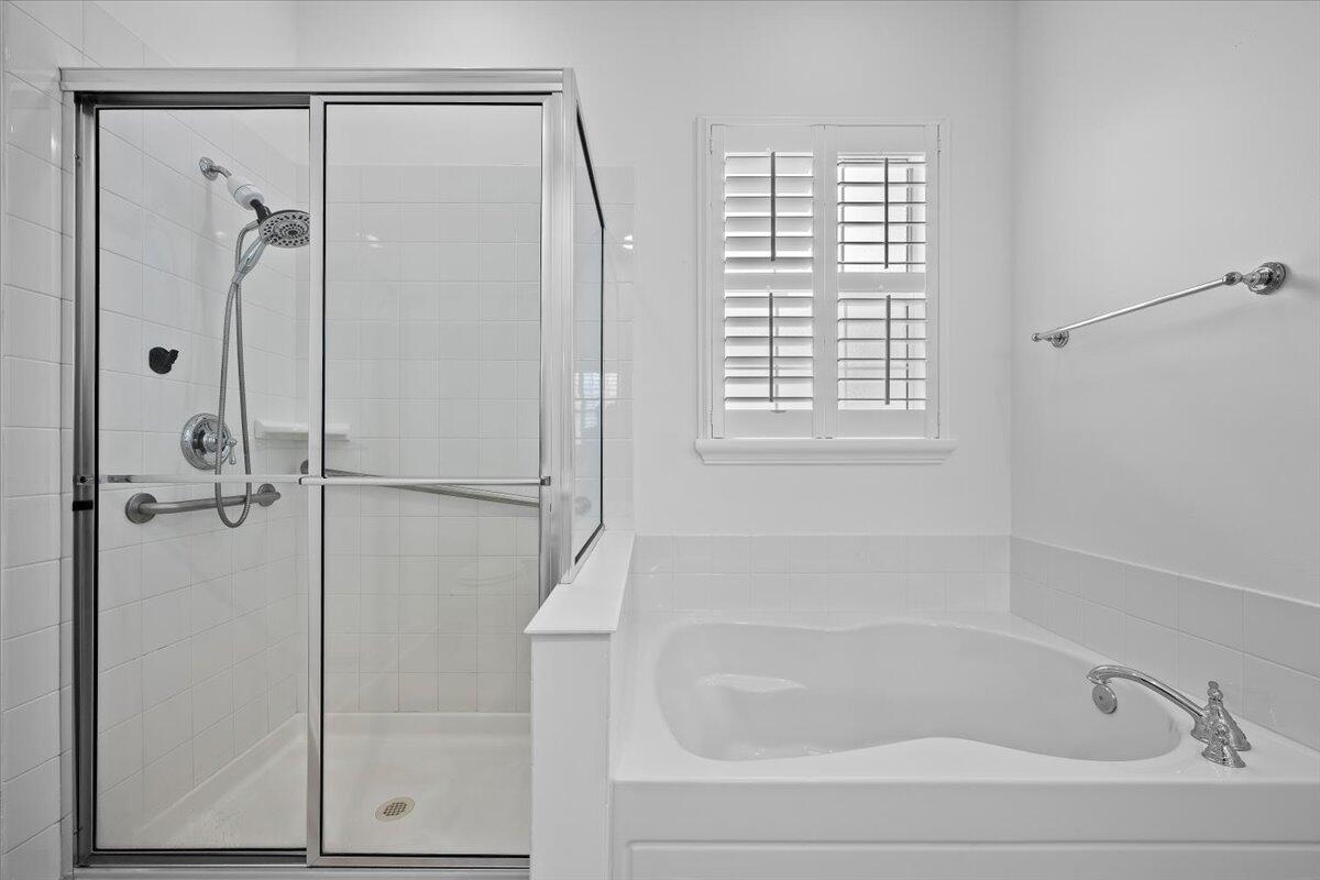 1041 Big Pine Way Jupiter, FL 33458 - Photo 21 of 44 Soaking Tub and Walk In Shower