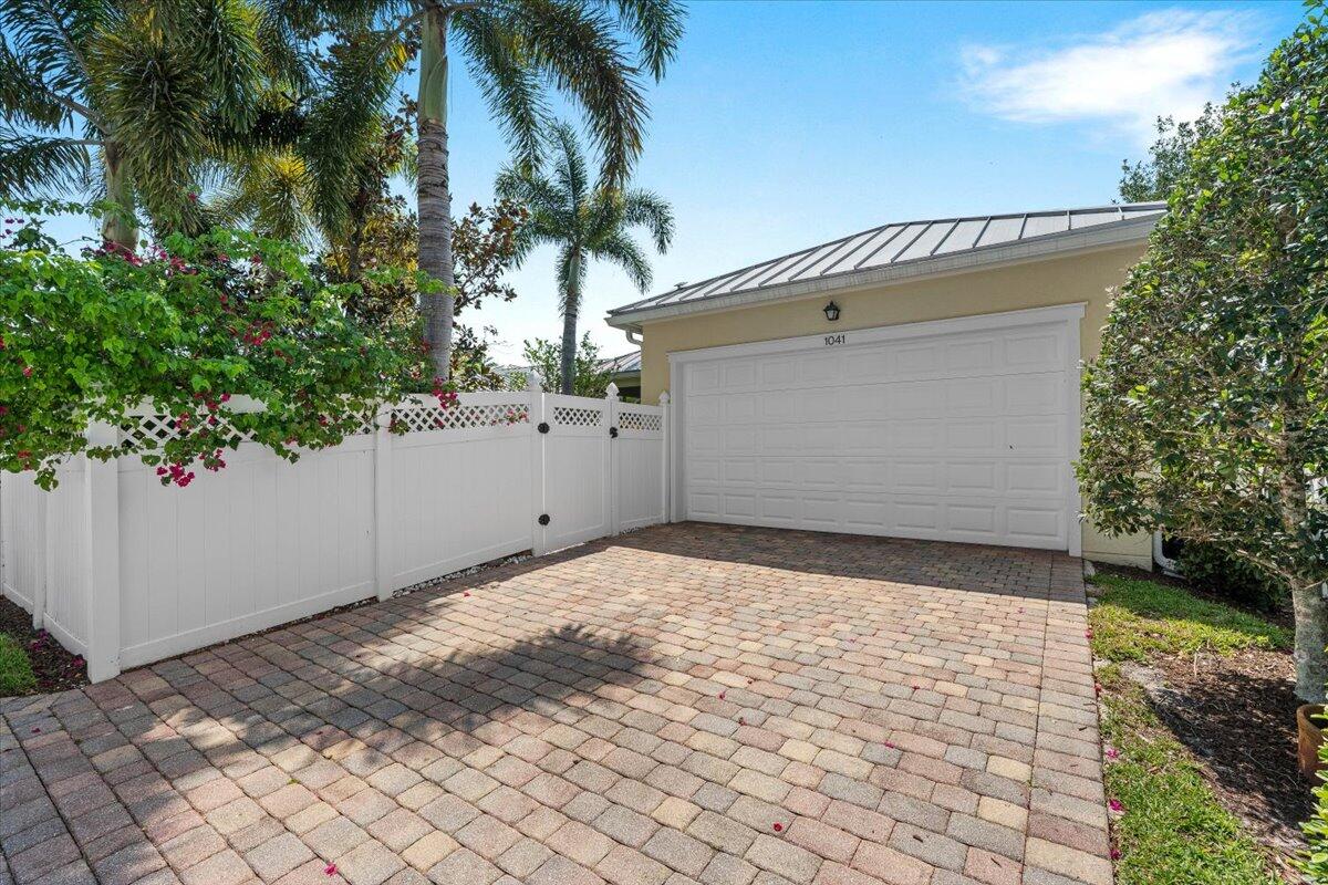 1041 Big Pine Way Jupiter, FL 33458 - Photo 34 of 44 Garage / Driveway